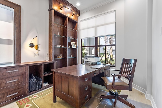 13471 Artisan Cir, Palm Beach Gardens, FL 33418 - home office with crown molding and light wood-style flooring