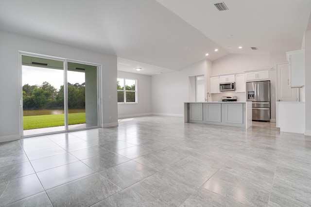 unfurnished living room featuring high vaulted ceiling, visible vents, baseboards, recessed lighting, and a sink