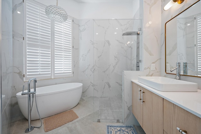2651 Players Ct, Wellington, FL 33414 - bathroom featuring vanity, a marble finish shower, and a soaking tub
