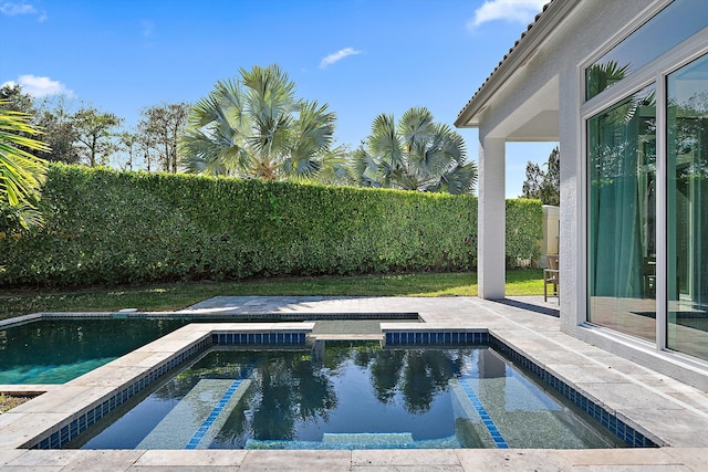 2651 Players Ct, Wellington, FL 33414 - view of swimming pool featuring a fenced backyard, a patio, and a pool with connected hot tub
