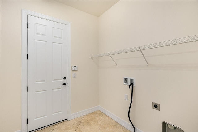 laundry room with light tile patterned floors, baseboards, washer hookup, laundry area, and hookup for an electric dryer