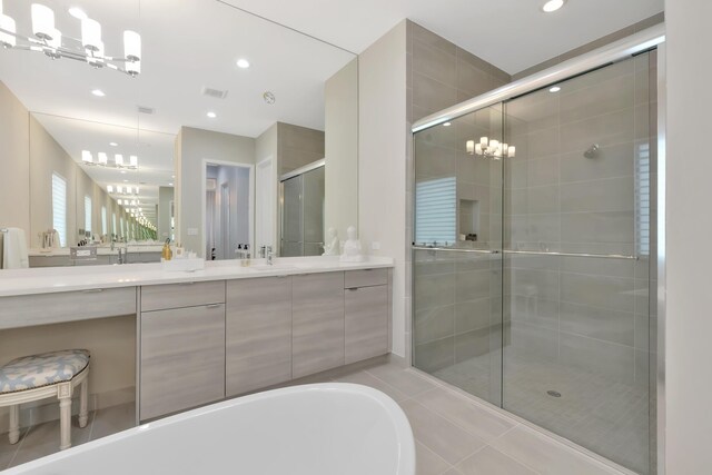 17118 Aquavera Way, Boca Raton, FL 33496 - bathroom featuring visible vents, a chandelier, a washtub, a stall shower, and vanity