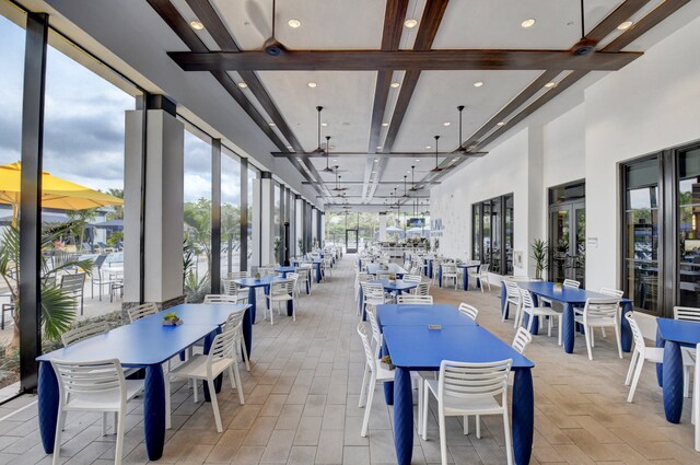 17118 Aquavera Way, Boca Raton, FL 33496 - dining area with beam ceiling, a high ceiling, recessed lighting, and coffered ceiling