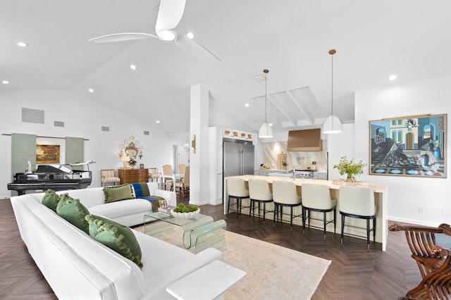 3510 Embassy Dr, West Palm Beach, FL 33401 - living area featuring recessed lighting, visible vents, baseboards, and high vaulted ceiling