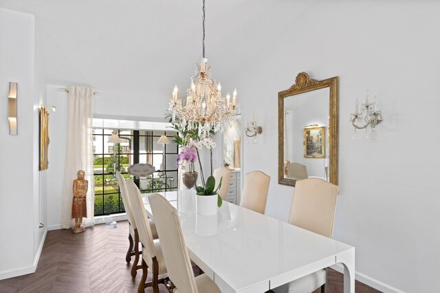3510 Embassy Dr, West Palm Beach, FL 33401 - dining room with baseboards and an inviting chandelier