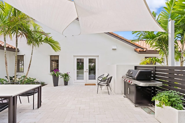 3510 Embassy Dr, West Palm Beach, FL 33401 - view of patio / terrace featuring area for grilling, french doors, and outdoor dining area