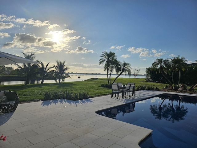 3510 Embassy Dr, West Palm Beach, FL 33401 - outdoor pool featuring a patio, a yard, and a water view