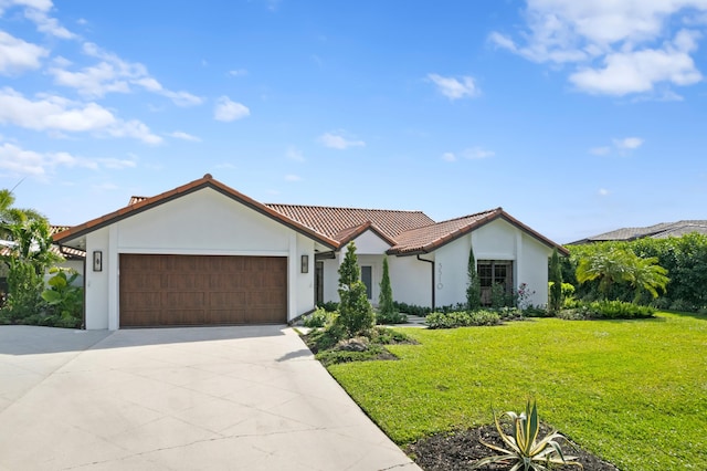 3510 Embassy Dr, West Palm Beach, FL 33401 - view of front of home featuring a front yard, an attached garage, driveway, and stucco siding