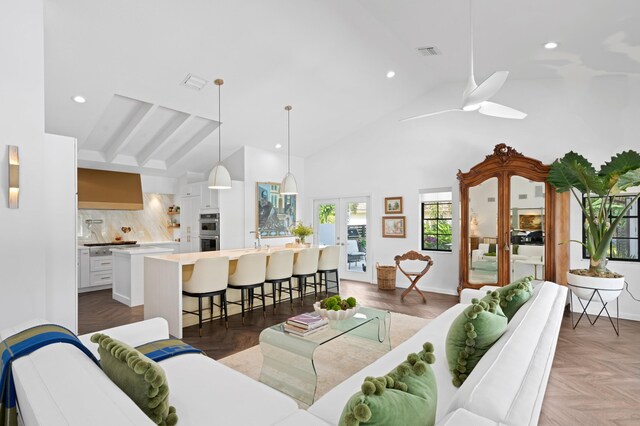 3510 Embassy Dr, West Palm Beach, FL 33401 - living room featuring recessed lighting, french doors, visible vents, and high vaulted ceiling