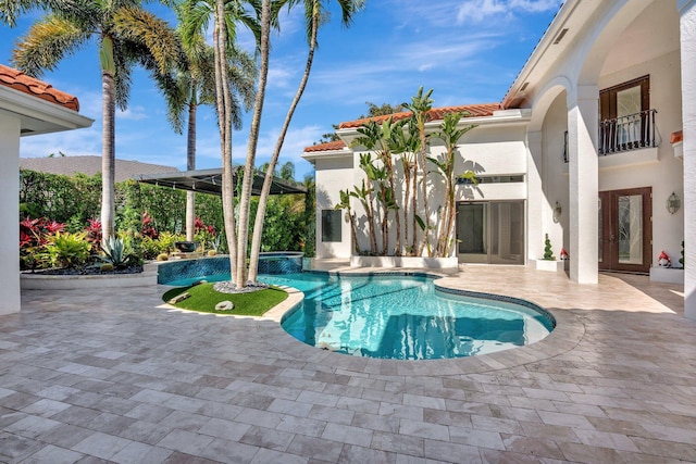 6131 NW 30th Ave, Boca Raton, FL 33496 - view of swimming pool with a pool with connected hot tub and a patio area