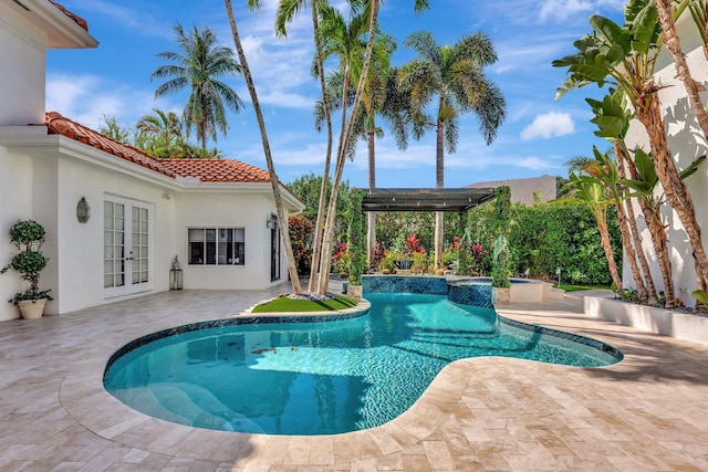 6131 NW 30th Ave, Boca Raton, FL 33496 - view of pool featuring french doors, a pool with connected hot tub, a pergola, and a patio area