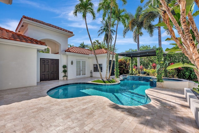 6131 NW 30th Ave, Boca Raton, FL 33496 - outdoor pool featuring french doors, a patio, and a jacuzzi