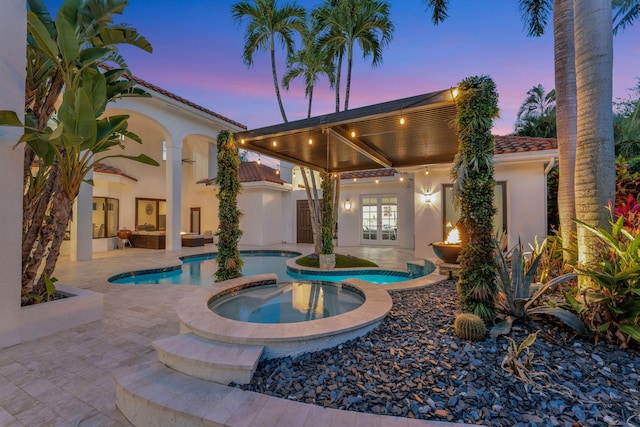 6131 NW 30th Ave, Boca Raton, FL 33496 - exterior space featuring an outdoor pool, french doors, an in ground hot tub, and a patio area