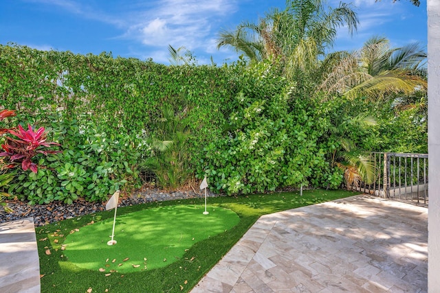 6131 NW 30th Ave, Boca Raton, FL 33496 - view of yard featuring a patio area and fence