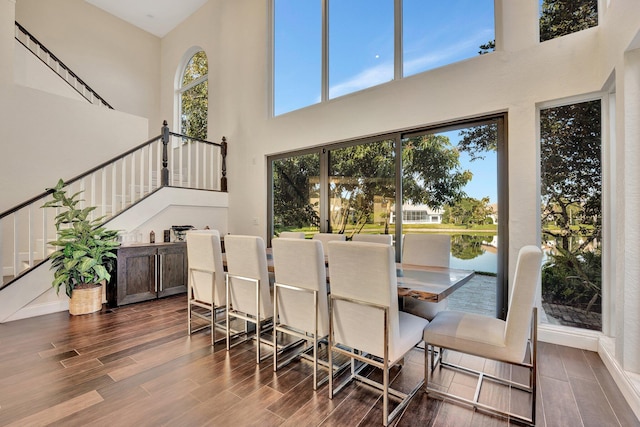 6131 NW 30th Ave, Boca Raton, FL 33496 - dining room with stairway and wood tiled floor
