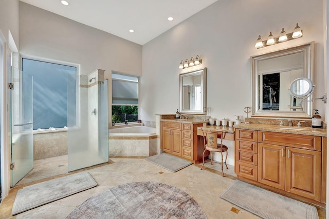 6131 NW 30th Ave, Boca Raton, FL 33496 - full bathroom featuring recessed lighting, a garden tub, vanity, and a walk in shower