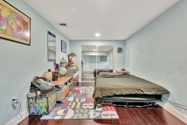 6131 NW 30th Ave, Boca Raton, FL 33496 - bedroom featuring visible vents, baseboards, and wood tiled floor