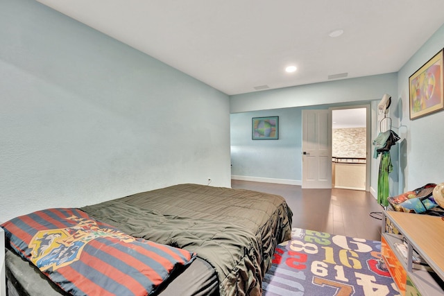 6131 NW 30th Ave, Boca Raton, FL 33496 - bedroom featuring visible vents, baseboards, and wood finished floors