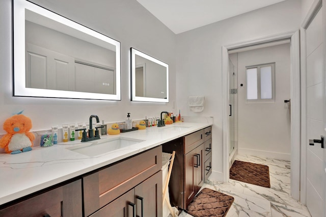 6131 NW 30th Ave, Boca Raton, FL 33496 - bathroom with double vanity, marble finish floor, baseboards, and a sink
