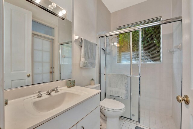 6131 NW 30th Ave, Boca Raton, FL 33496 - bathroom featuring vanity, a shower stall, and toilet