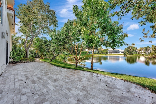 6131 NW 30th Ave, Boca Raton, FL 33496 - view of patio with a water view