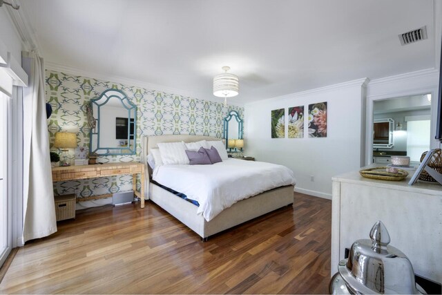 11753 Landing Pl, Palm Beach Gardens, FL 33408 - bedroom with wallpapered walls, crown molding, wood finished floors, and baseboards