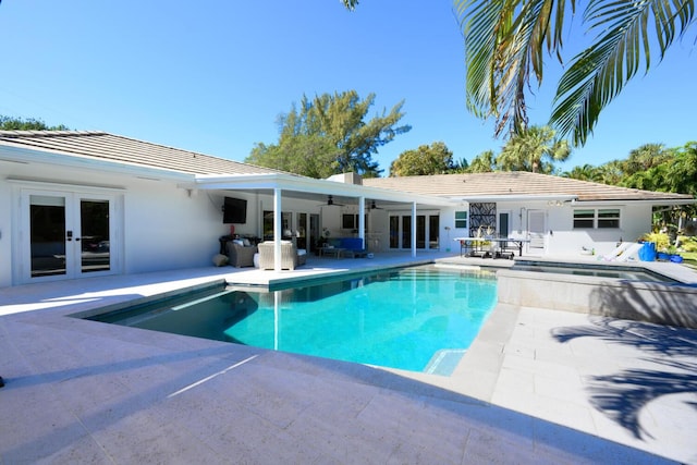 11753 Landing Pl, Palm Beach Gardens, FL 33408 - outdoor pool featuring french doors, ceiling fan, and a patio