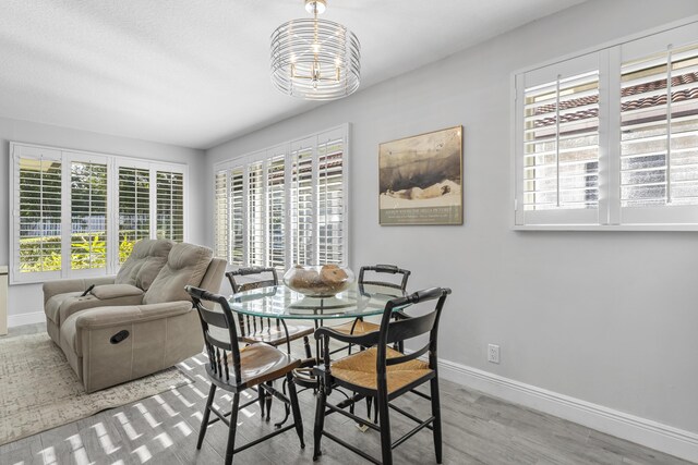 334 NW 42nd St, Boca Raton, FL 33431 - dining space with wood finished floors and baseboards