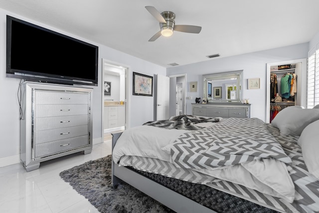 334 NW 42nd St, Boca Raton, FL 33431 - bedroom with a spacious closet, visible vents, ensuite bath, and baseboards