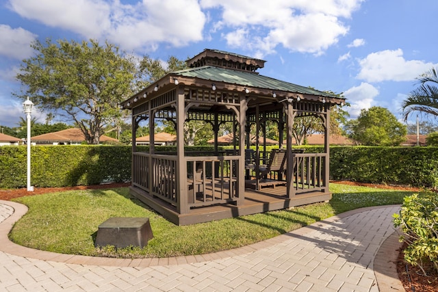 334 NW 42nd St, Boca Raton, FL 33431 - view of property's community with a gazebo, a lawn, and fence