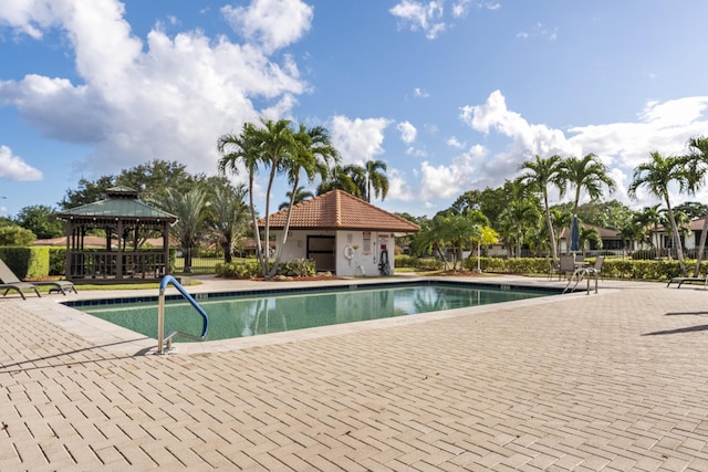 334 NW 42nd St, Boca Raton, FL 33431 - community pool featuring a gazebo and a patio area