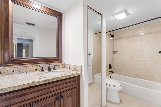 9919 NW 6th Ct, Plantation, FL 33324 - full bathroom featuring bathing tub / shower combination, toilet, visible vents, tile patterned flooring, and vanity