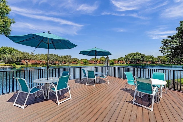 9919 NW 6th Ct, Plantation, FL 33324 - wooden deck with outdoor dining area and a water view