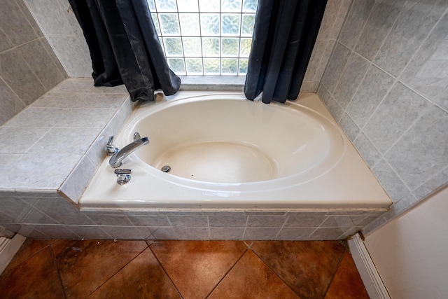 bathroom with a garden tub