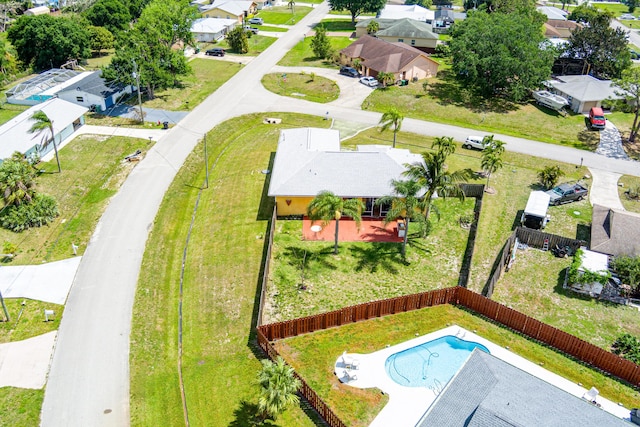 birds eye view of property with a residential view