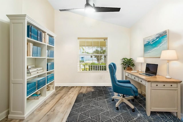 2394 SW Estella Ter, Palm City, FL 34990 - home office with lofted ceiling, baseboards, light wood-type flooring, and a ceiling fan