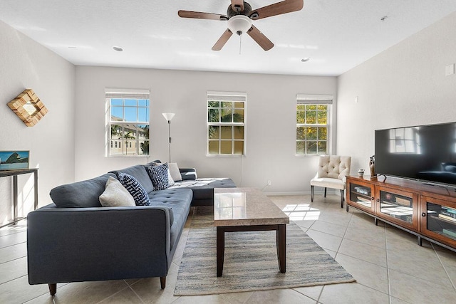 105 Black Ironwood Rd Unit 106, Jupiter, FL 33458 - living room featuring light tile patterned floors and a ceiling fan