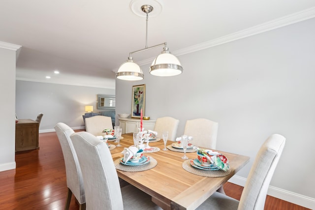 206 Lake Susan Ln, West Palm Beach, FL 33411 - dining area with crown molding, baseboards, and wood finished floors
