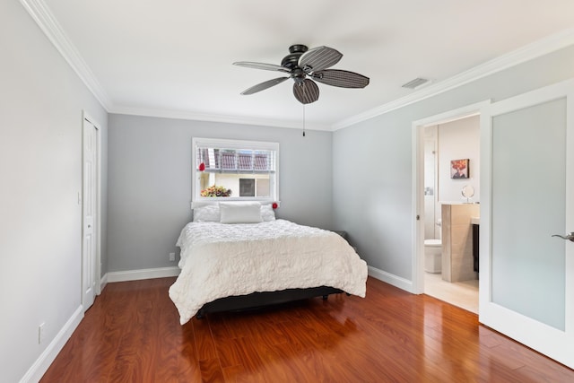 206 Lake Susan Ln, West Palm Beach, FL 33411 - bedroom with visible vents, baseboards, wood finished floors, and ornamental molding