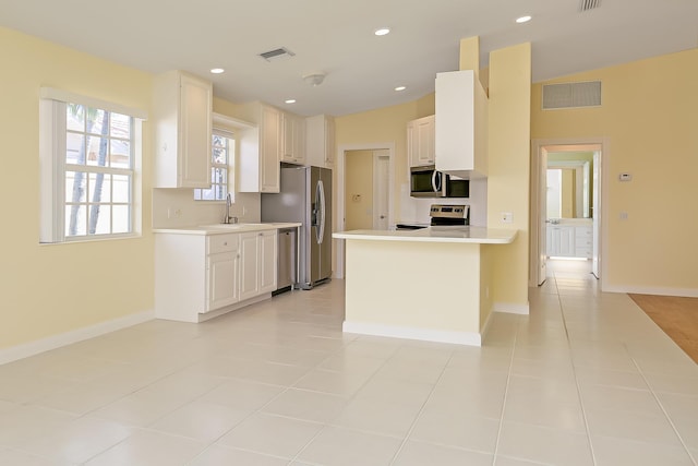 10828 SW Dardanelle Dr, Port Saint Lucie, FL 34987 - kitchen with recessed lighting, stainless steel appliances, baseboards, and visible vents