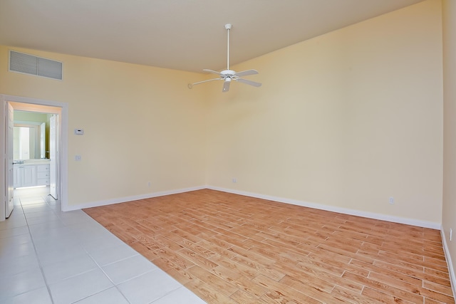 10828 SW Dardanelle Dr, Port Saint Lucie, FL 34987 - unfurnished room with visible vents, light wood-style flooring, baseboards, and ceiling fan