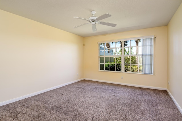 10828 SW Dardanelle Dr, Port Saint Lucie, FL 34987 - carpeted empty room featuring a ceiling fan and baseboards
