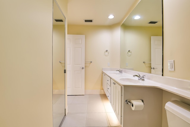 10828 SW Dardanelle Dr, Port Saint Lucie, FL 34987 - bathroom with tile patterned flooring, visible vents, toilet, and a sink