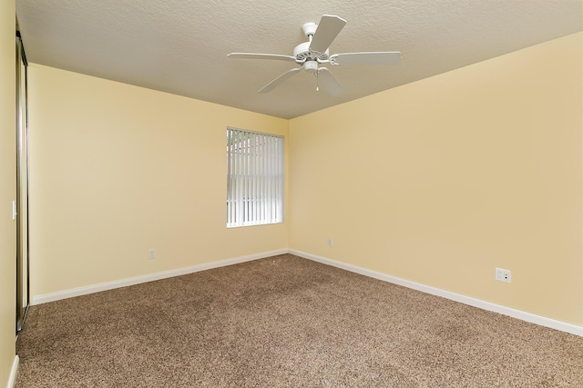 10828 SW Dardanelle Dr, Port Saint Lucie, FL 34987 - empty room with a ceiling fan, baseboards, carpet floors, and a textured ceiling