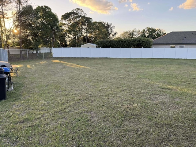 view of yard featuring fence