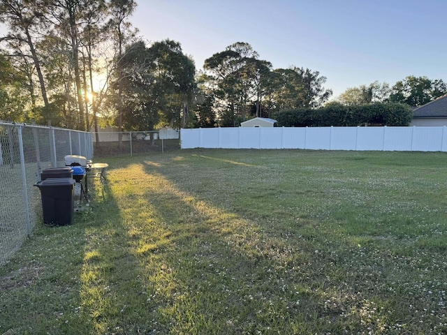 view of yard featuring fence