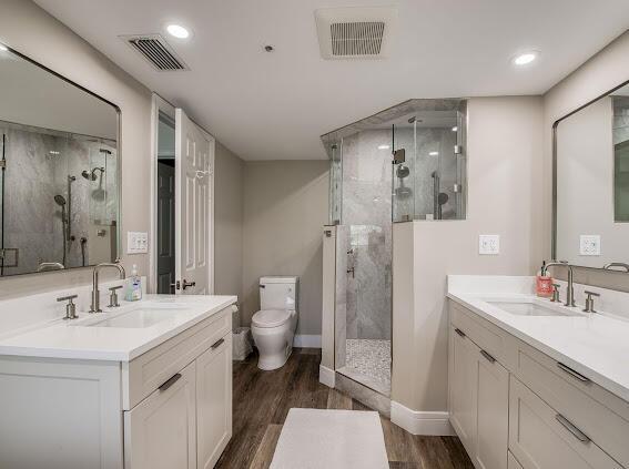 1000 N US Highway 1 Unit 656, Jupiter, FL 33477 - bathroom with a sink, visible vents, and a shower stall