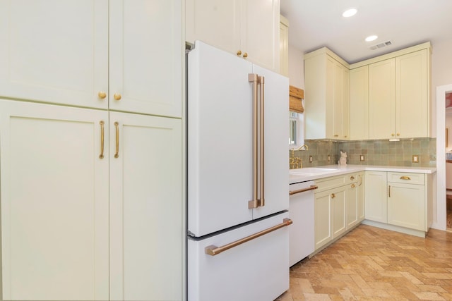 426 30th St, West Palm Beach, FL 33407 - washroom with stacked washer and clothes dryer and cabinet space