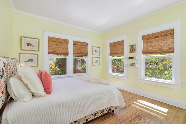 426 30th St, West Palm Beach, FL 33407 - sitting room with crown molding, wood finished floors, and baseboards