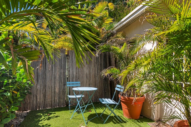 426 30th St, West Palm Beach, FL 33407 - view of yard featuring a patio area, an outdoor structure, and fence